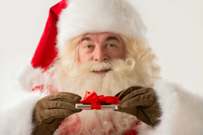 Weihnachtsmann mit Smartphone