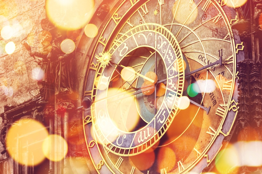 Prague Astronomical clock on Old Town Square, Famous tourist landmark with vintage retro tone effect and bokeh light